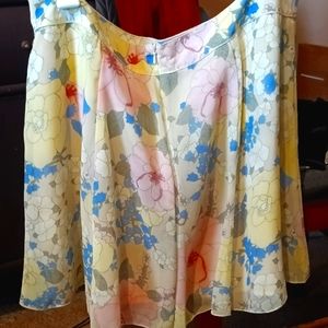 This is a beautiful skirt by Bisou Bisou. Size 14.